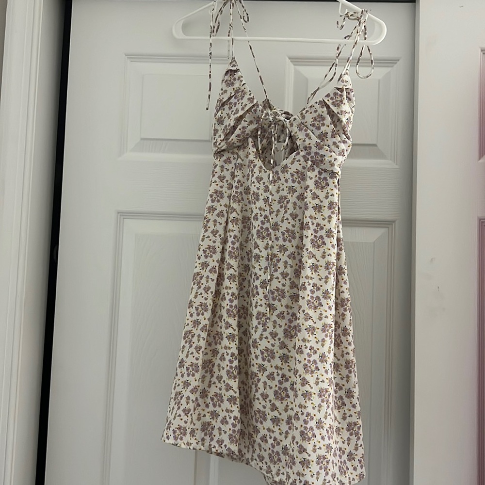 Small white forever 21 sundress with purple floral design. Never worn